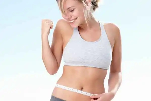 woman happy after fat reduction treatment Sudbury