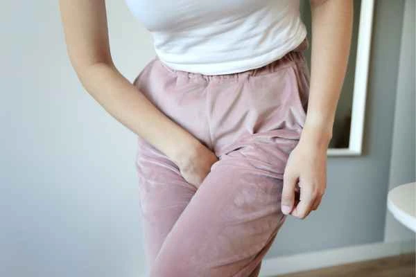 woman running for the toilet because of urinary incontinence Sudbury